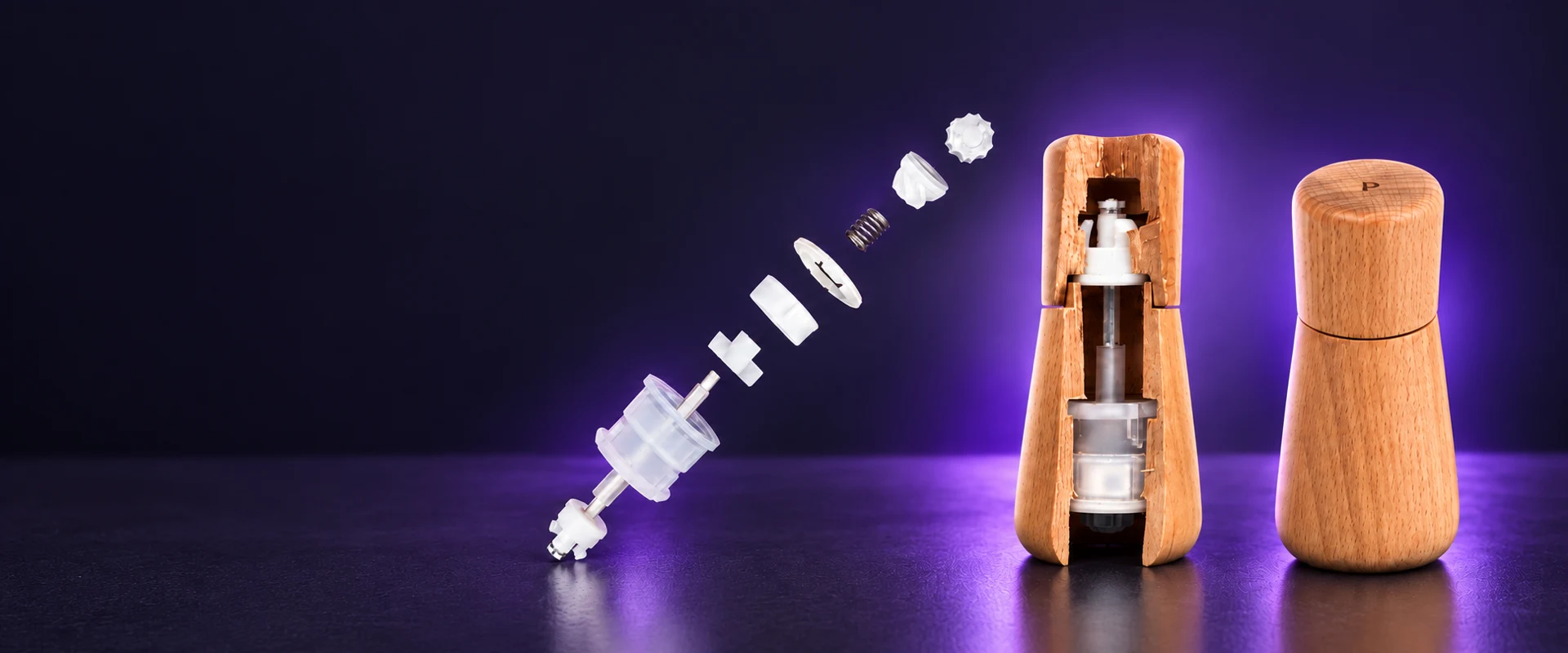 Illustrative rendering based on A-LIFE product photographs: grinding components, wooden mill cutaway and complete pepper mill