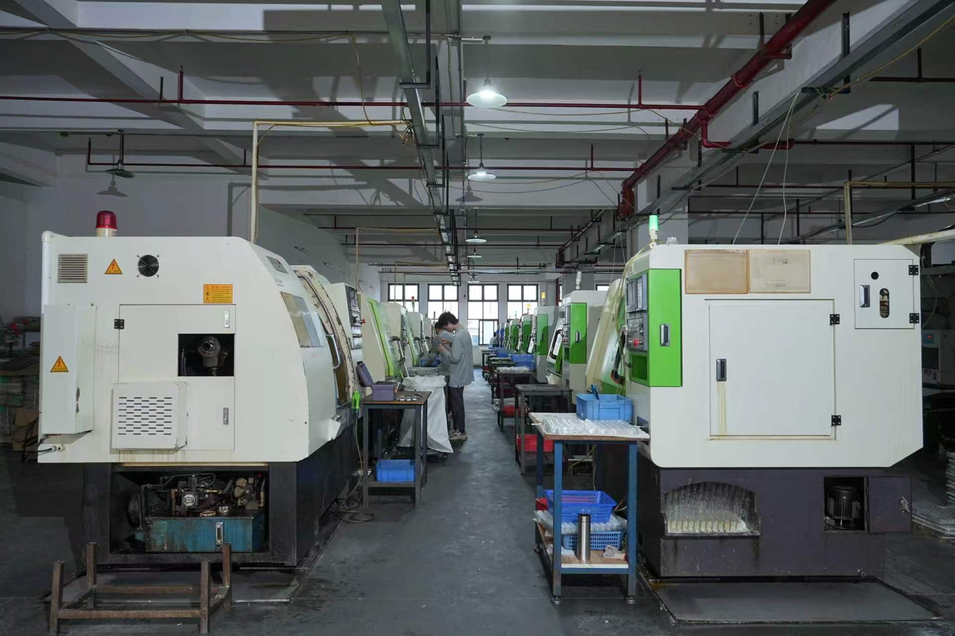 Machining equipment and operators on the production floor